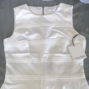 White knee length dress